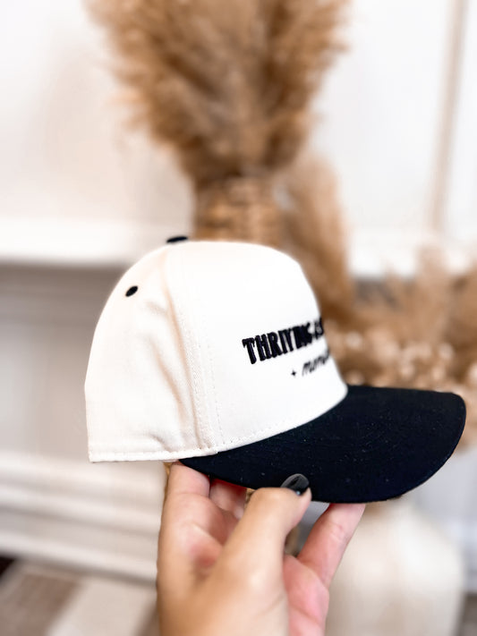 THRIVING & SURVIVING TRUCKER HAT